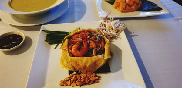 High angle view of food served on table