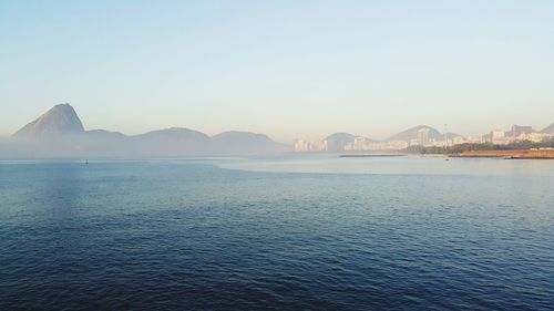 Scenic view of calm sea against clear sky