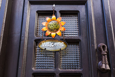 Close-up of text on door of building