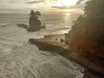 Scenic view of sea against sky during sunset