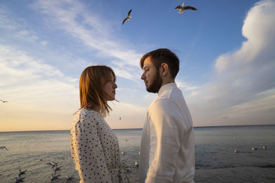 Kaliningrad, russia. young couple in love on the seaside