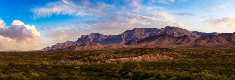 Panoramic view of landscape and mountains against sky