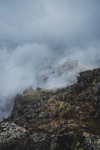 Aerial view of volcanic mountain against sky