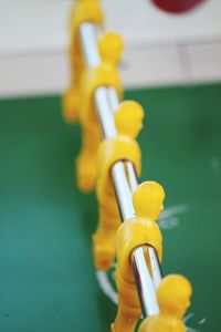 Close-up of yellow toy on table