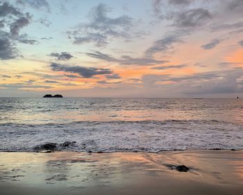 Scenic view of sea against sky during sunset