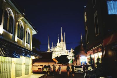 View of illuminated buildings at night