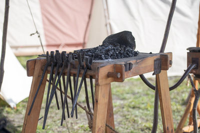 Close-up of charcoal on table