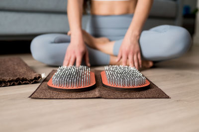 Close up of wooden yoga board with nails for yoga practice and meditation. sadhu board