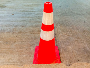 High angle view of red flag on road