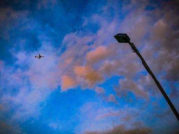 Low angle view of airshow against blue sky