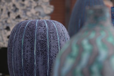 Close-up of multi colored decorations for sale at market stall