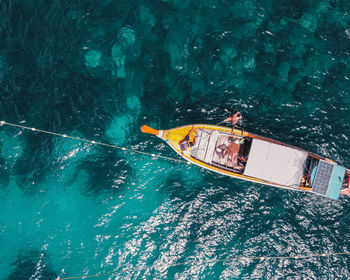 High angle view of sailboat sailing in sea