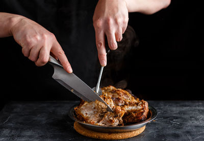 Midsection of person preparing food on table