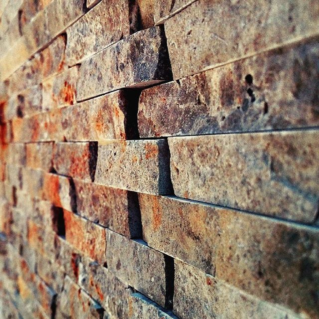 full frame, backgrounds, textured, pattern, close-up, wall - building feature, brick wall, rough, built structure, detail, weathered, architecture, wall, repetition, no people, old, day, metal, brick, in a row