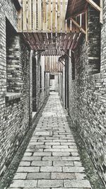 Narrow alley in front of building