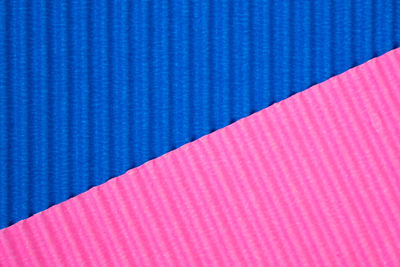 High angle view of multi colored umbrella on paper