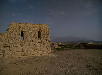 Old ruin building against sky