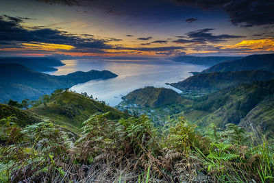 Scenic view of mountains against sky during sunrise