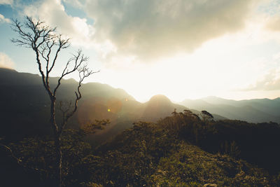 Scenic view of mountains against sky during sunset