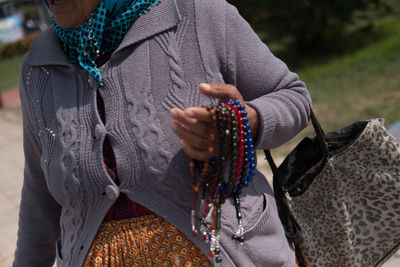 Midsection of woman with hands