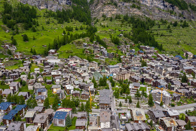 High angle view of townscape and trees in city