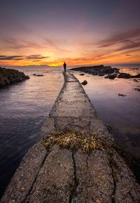 Scenic view of sea at sunset