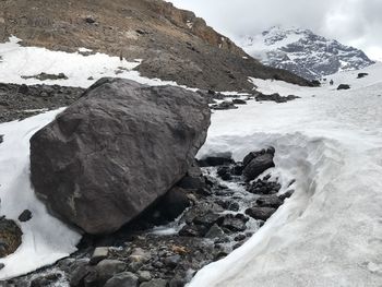 Scenic view of mountains against sky during winter