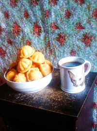 Close-up of coffee cup on table