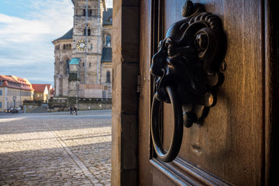 Close-up of metal door knocker at bamberg cathedral