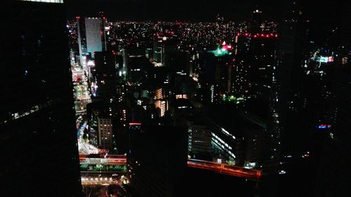 Illuminated cityscape at night