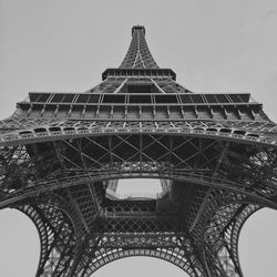 Low angle view of eiffel tower against clear sky in city