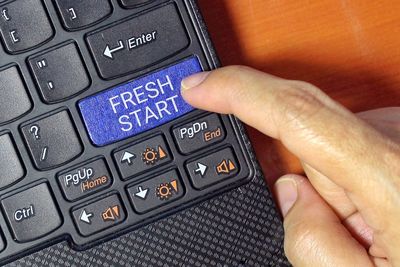 Close-up of man using mobile phone