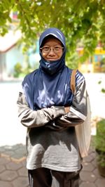 Portrait of man standing outdoors
