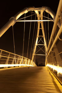 View of suspension bridge at night