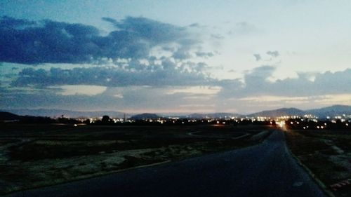 Empty road along landscape