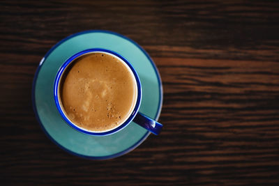 High angle view of coffee on table