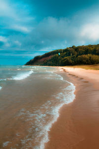 Scenic view of beach against sky