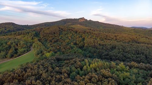 Scenic view of landscape against sky during sunset