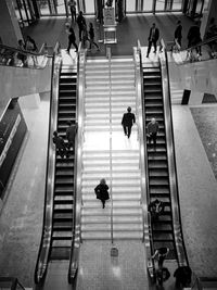 High angle view of people on stairs and escalators