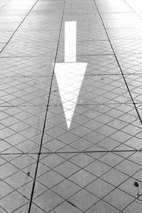 Arrow symbol on ground