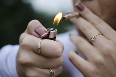 Close-up of woman holding hands