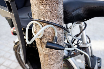 Close-up of bicycle parked on street