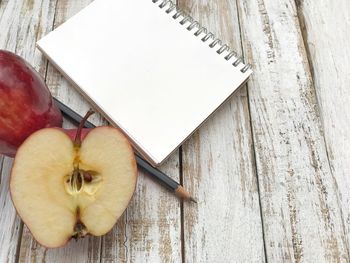 High angle view of apple on table