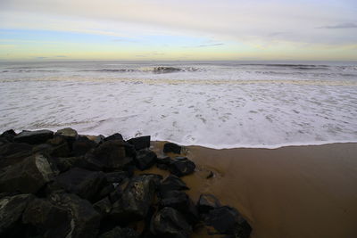 Scenic view of sea against sky during sunset