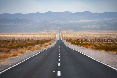 Road leading towards mountains