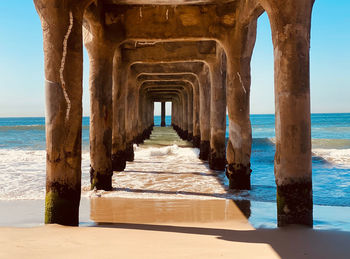 View of pier on beach