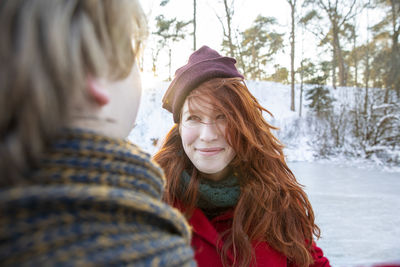 Portrait of woman wearing hat during winter