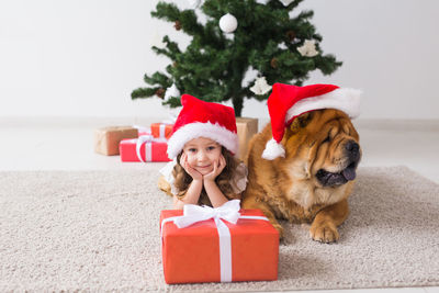 Portrait of cute girl with dog