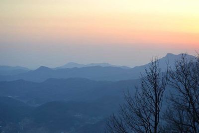 Scenic view of mountains at sunset