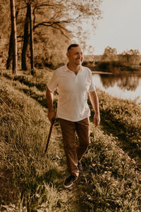 Full length of man standing on field